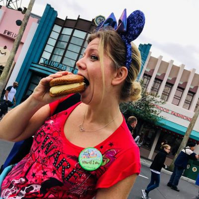 Dining and eating delicious snacks is an important part of my vacation. Here I am enjoy one of my favourite treats -- a carrot cake cookie at Disney's Hollywood Studios. 